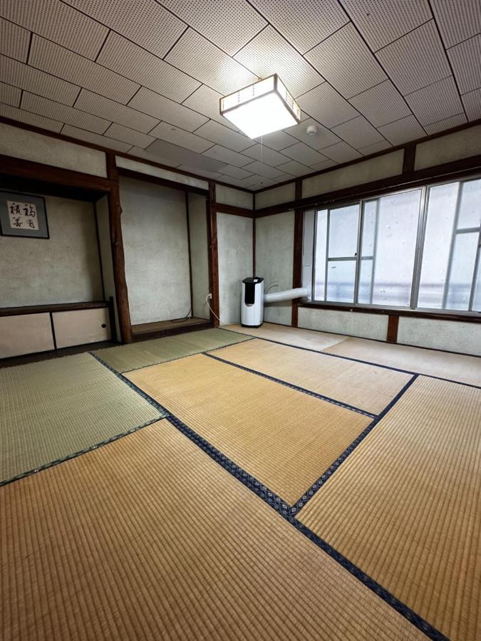 素泊まり民宿とみや Oshima Екстер'єр фото